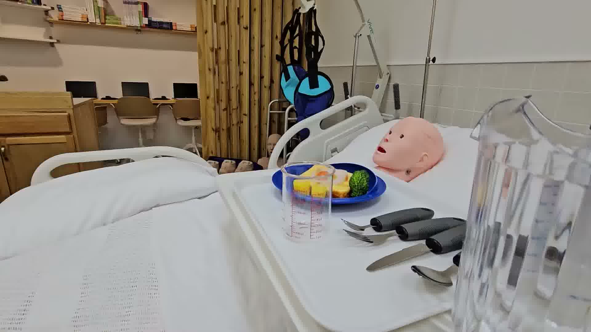 Training facility setup showing room arrangement and equipment.