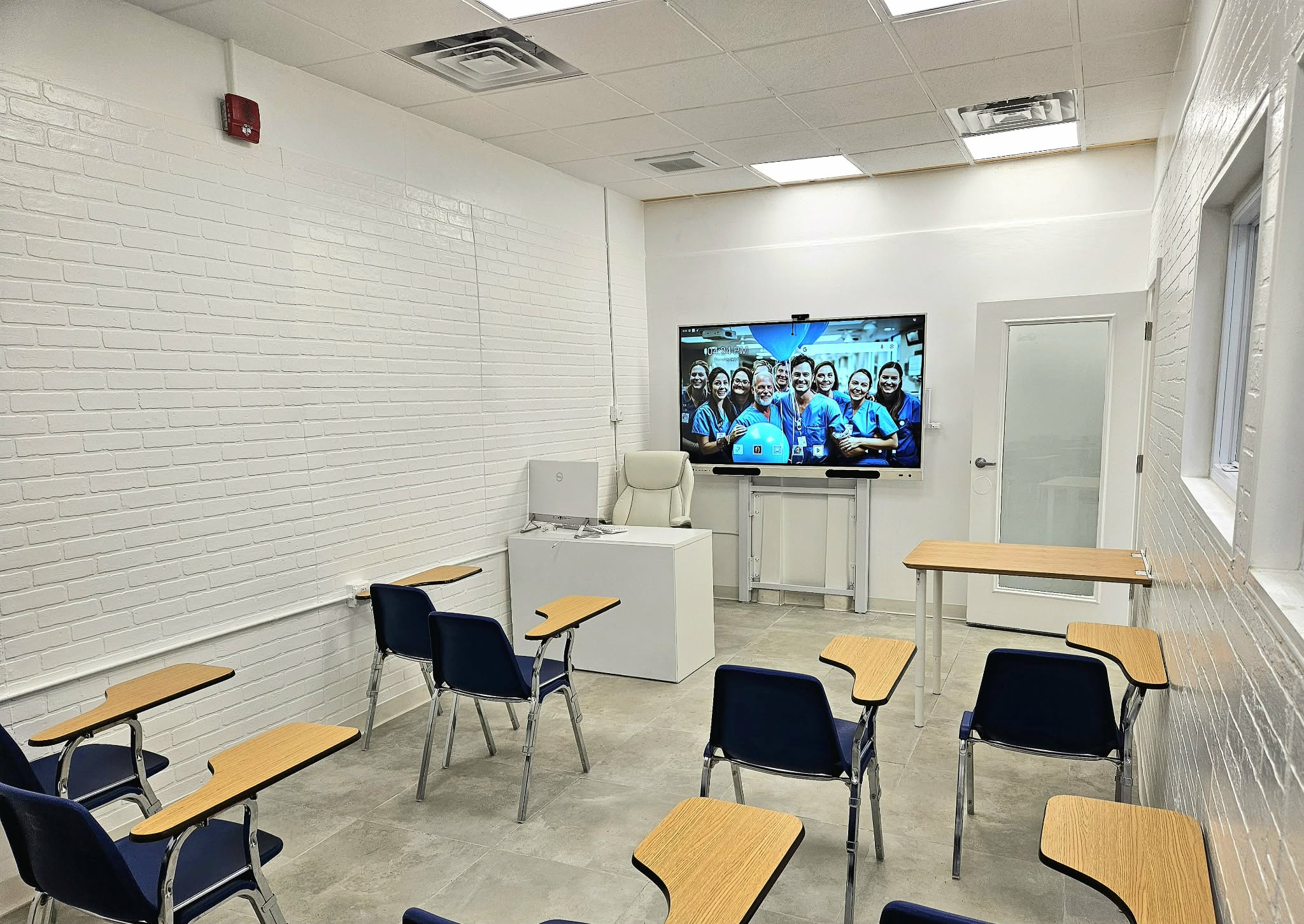 Back-facing classroom view showing student seating layout.