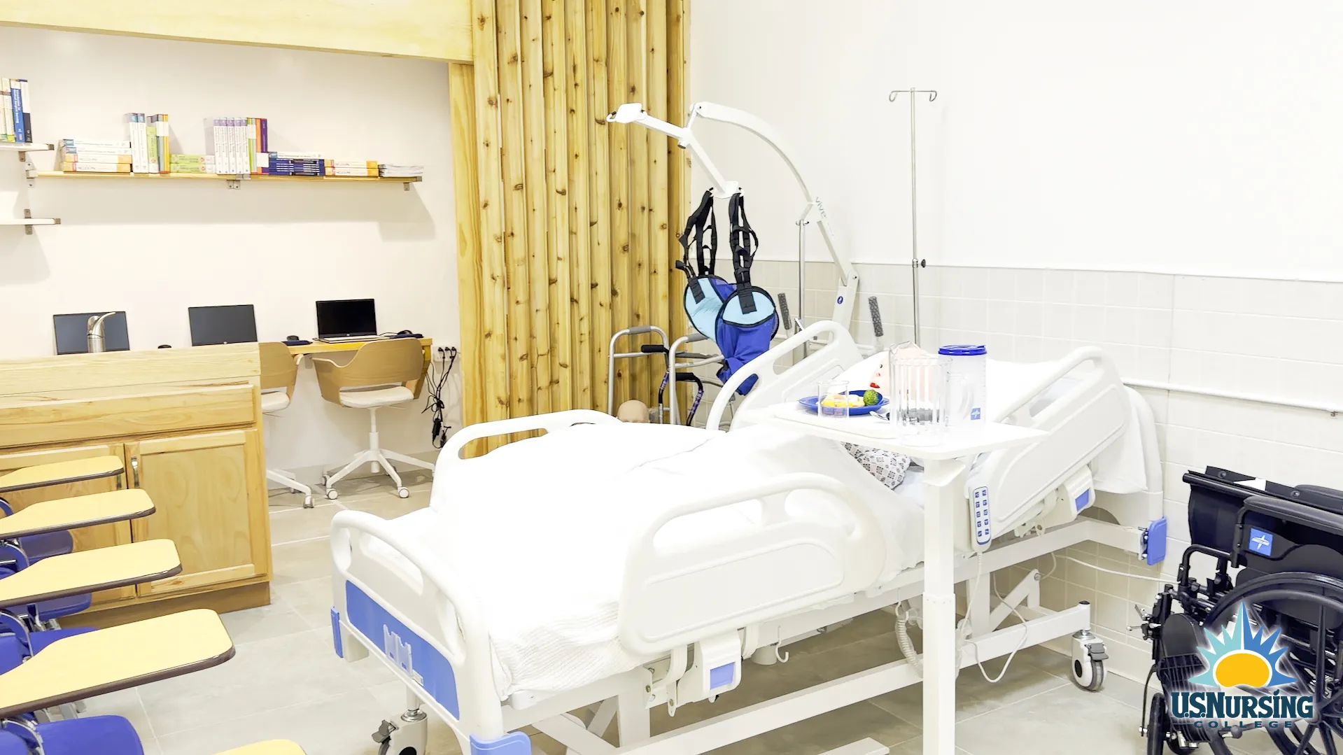 Hospital room simulation lab with patient beds and medical equipment